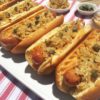 Hot Dogs Topped with Sauerkraut and Capers